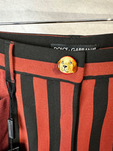 Load image into Gallery viewer, Dolce and gabbana Rust and black Striped flared trousers, Size 38
