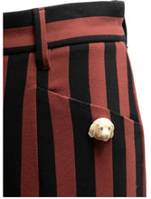 Load image into Gallery viewer, Dolce and gabbana Rust and black Striped flared trousers, Size 38
